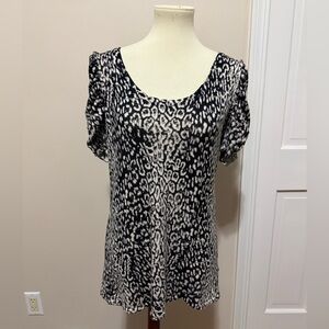 Style & Co top. Size XL. Stretchy with animal print. Excellent condition.